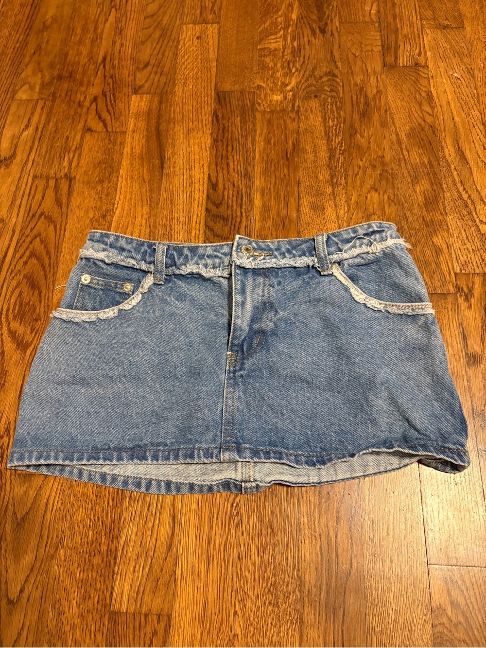 Edikted Light Blue Denim Mini Skirt with Frayed Waist Trim